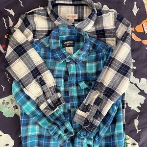 Two plaid boys long sleeve flannels